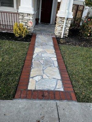 Flagstone walkway and brick border