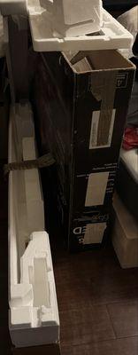 Styrofoam protecting TV from the box.