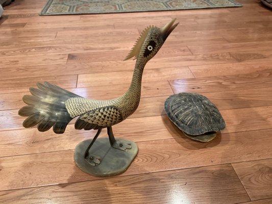 Not the turtle shell, but the interesting bird made from a horn is one of many finds that are now in the store.