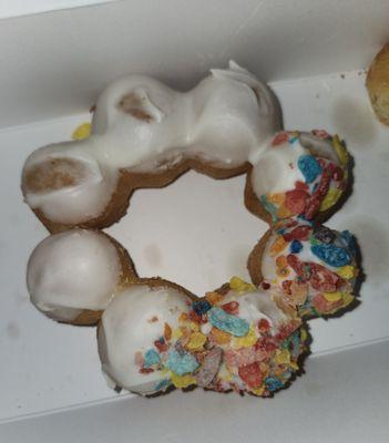 Messy! And c'mon sprinkling the cereal on the whole donut isn't gonna break the bank. Especially when we're paying $3.33 for one donut!