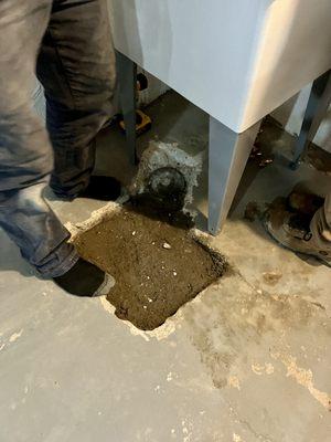 Exposing the main drain clean out cap