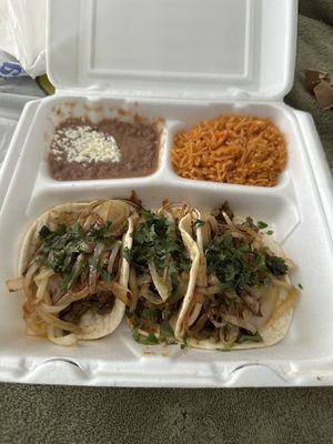 3 Tacos on Flour with beans & rice