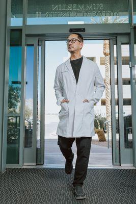 Dr. Shawn Tsuda entering the office building