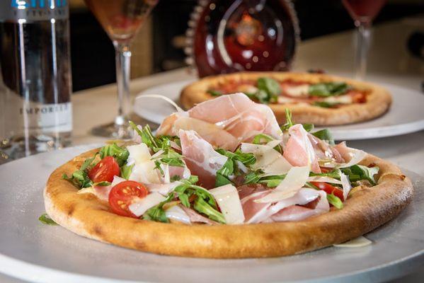 Pizza Bianca (no red sauce), Prosciutto, Arugula, Cherry Tomato, Shaved Parmigiano