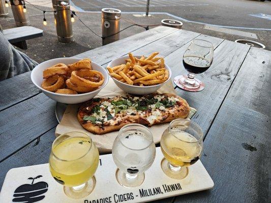 Margarita pizza, onion rings and fries