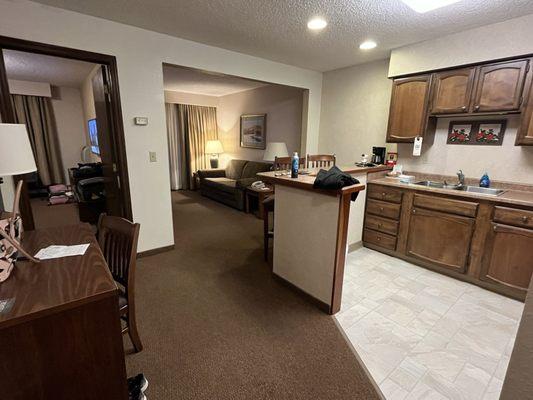 Picture shows the kitchen that's equipped with cooking   Utensils and dishes.