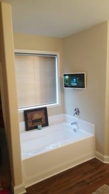 21" monitor installed above tub, with GFCI outlet installed.