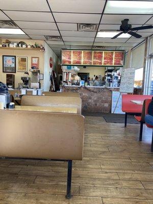 Inside the cafe. Menu above ordering counter & specials listed on the dry erase board. The ladies working are very nice.