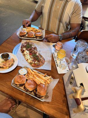 Bacon Jam Burger, All-American Burger, Birria Taco, Pesto Chicken Bacon Pizza and A flight