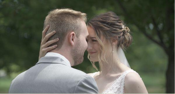 Loving embrace between bride and groom