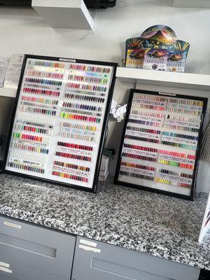 Dip Powe]der and some gel polish selections they have displayed in the front.