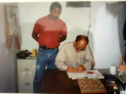 A photo with Thornton and Grandmaster Moy Yat.