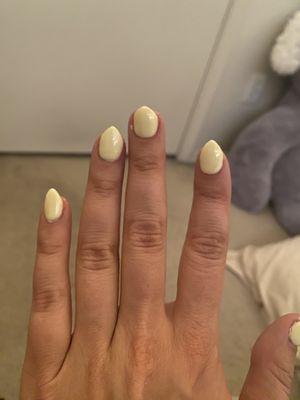 Messy + definitely not the almond shape displayed in the nail salon