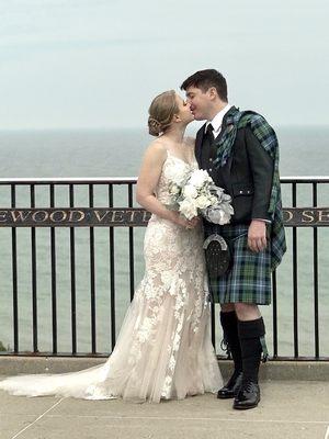 Bride and Groom kissing at Atwater Beach Milwaukee