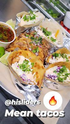 Blackened shrimp tacos, biria tacos, and kalua tacos.