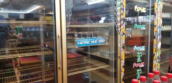 Empty Cooler Shelves