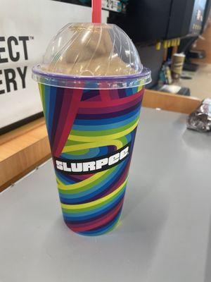 Coke slurpee in a collectors cup.