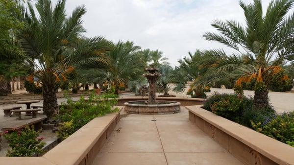 Fountain in front of entrance. With dates!