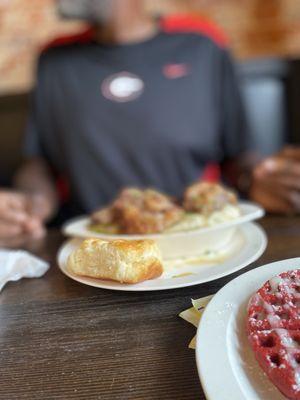 oxtails and gritz and red velvet waffle.