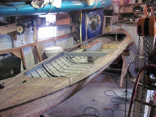 Old Sailing canoe restoration started at Saugatuck Wooden Boat