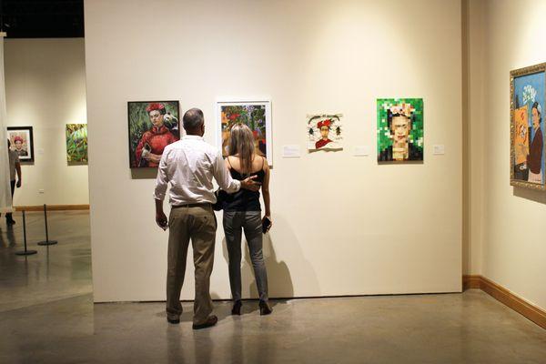 Visitors enjoy "The World of Frida" open March 26 - August 29, 2021