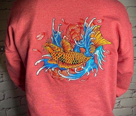 Embroidery Art Japanese Koi embroidered on the back of a sweatshirt