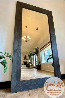 This is a very large  reclaimed barn wood framed wall leaning Farmhouse mirror. Handmade in Texas. 7.45 Ft Tall 3.9 Ft Wide
