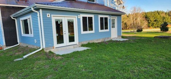 New porch, siding, windows & doors