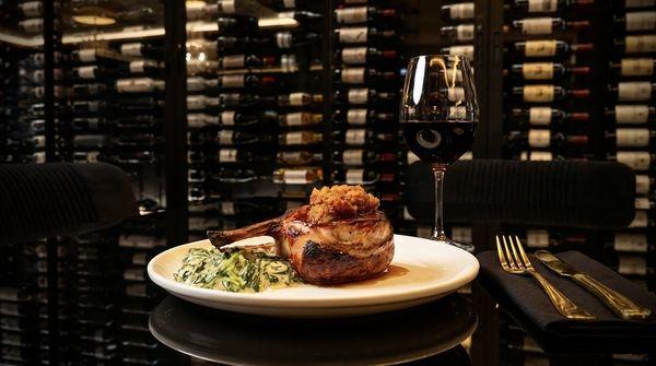 Drunken Apple Chop- 14 oz tea-brined pork chop with maple glaze & bourbon apple mustard, choice of side