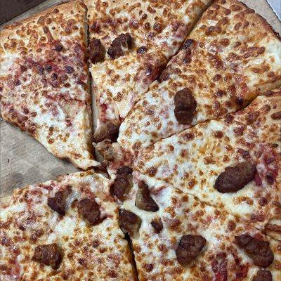 We ordered extra sausage and specialty pepperoni pizza. Not sure what happened to the toppings!!