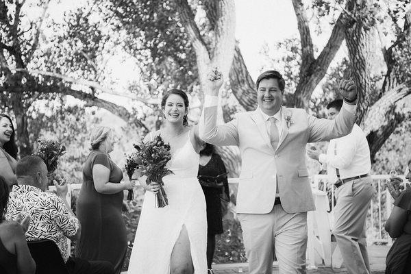 Post ceremony joy. Wedding recessional.