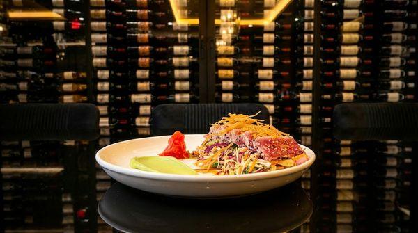 Yellowfin Tuna Salad- Cabbages, cucumber, onion, cilantro, marcona almond, wonton strips, sesame seared tuna asian dressing & wasabi mayo