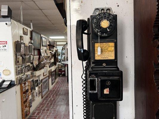Vintage wall telephone and an awesome assortment of antique photographs