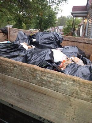 Trash brought into my driveway. Expected empty dumpster to take away debris from my old roof.