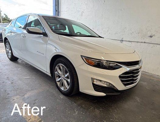 Chevrolet Malibu after front-end repair and refinish with clean panel alignment and OEM-quality finish