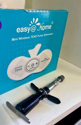 The tool Dr. Bruce uses to help with adjustments and a TENS unit (provides electrical stimulation to injured muscles)