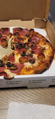 Medium combo pizza with no peppers, Olives, or onion.