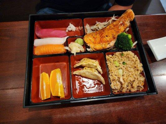 Bento box with sushi  and teriyaki salmon about $25