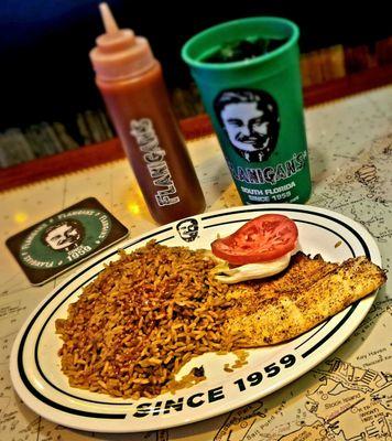 Blackened mahi-mahi aka dolphin, with dirty rice, some of their famous bbq sauce, and a Diet Coke.
