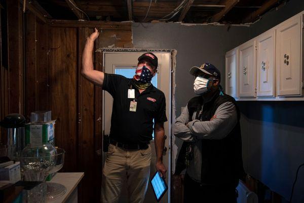James, on-site, inspecting local roof damage, call a public adjuster first!
