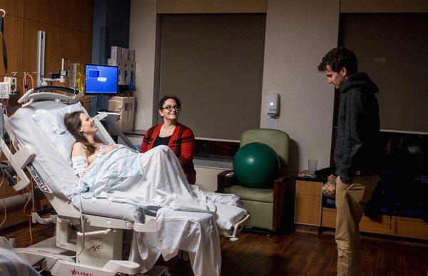 Samantha, me, and my husband after delivery