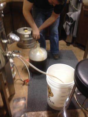 Beer School... pitching the yeast!  Now the sweet wort will become beer!