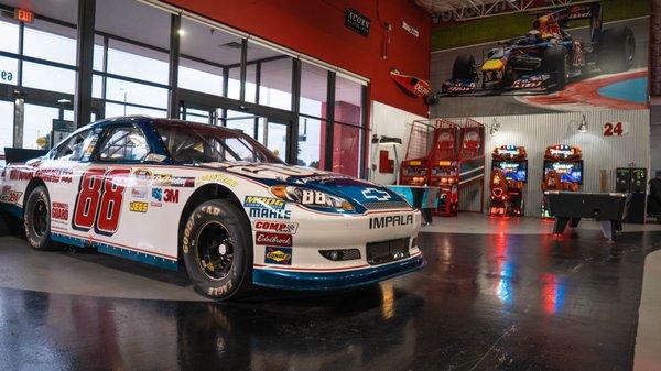 An authentic NASCAR vehicle sits on display.