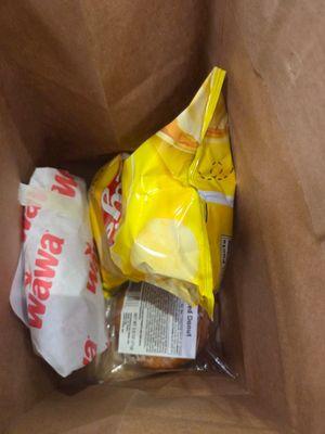 Our Turkey and Bacon toasted sandwiches with potato chips and a cookie to split.