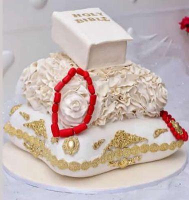 Pillow and a Bible traditional African cake
