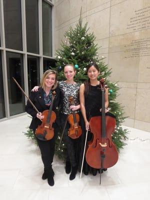 Amber, Sarah, and Juli after a holiday party performance at the Atlanta History Center.
