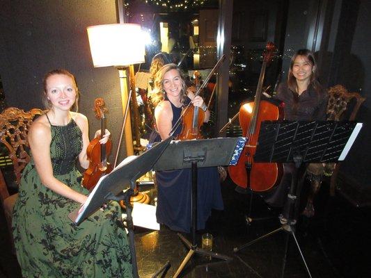 Sarah, Amber, and Juli performing at our 2016 holiday party at The Peachtree Club in Midtown.