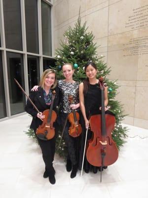 Amber, Sarah, and Juli after a holiday party performance at the Atlanta History Center.
