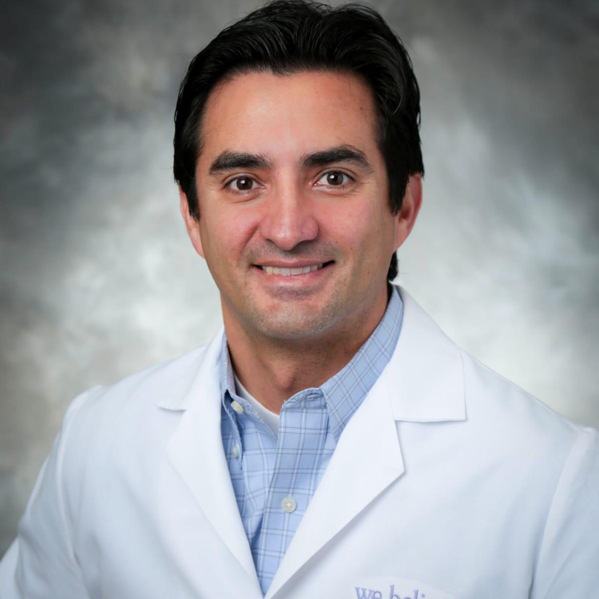 Carlos Alarcon, MD