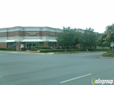 Roosters Men's Grooming Center